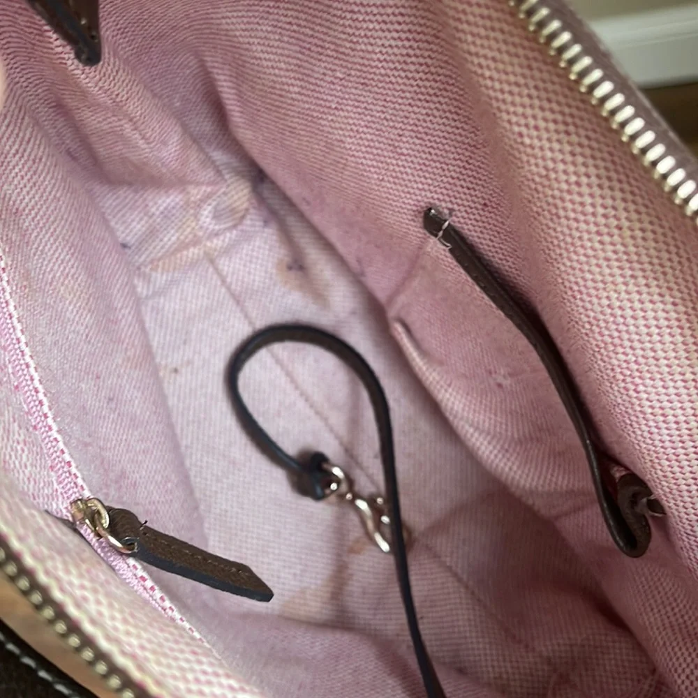 Dooney and Bourke. Brown leather shoulder bag. Has interior stains. - Picture 9 of 14